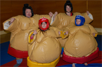 Costume de sumos gonflables pour fête en plein air sur Paris, Poitiers, Reims, Rouen, Tours, Le Mans, Chartres, Lille, etc.